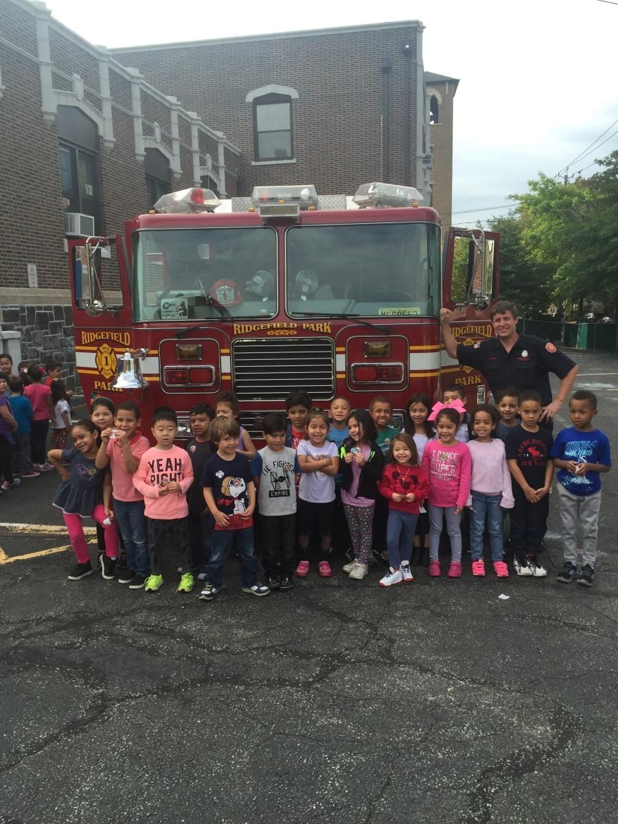 Children in Front of Fire Truck