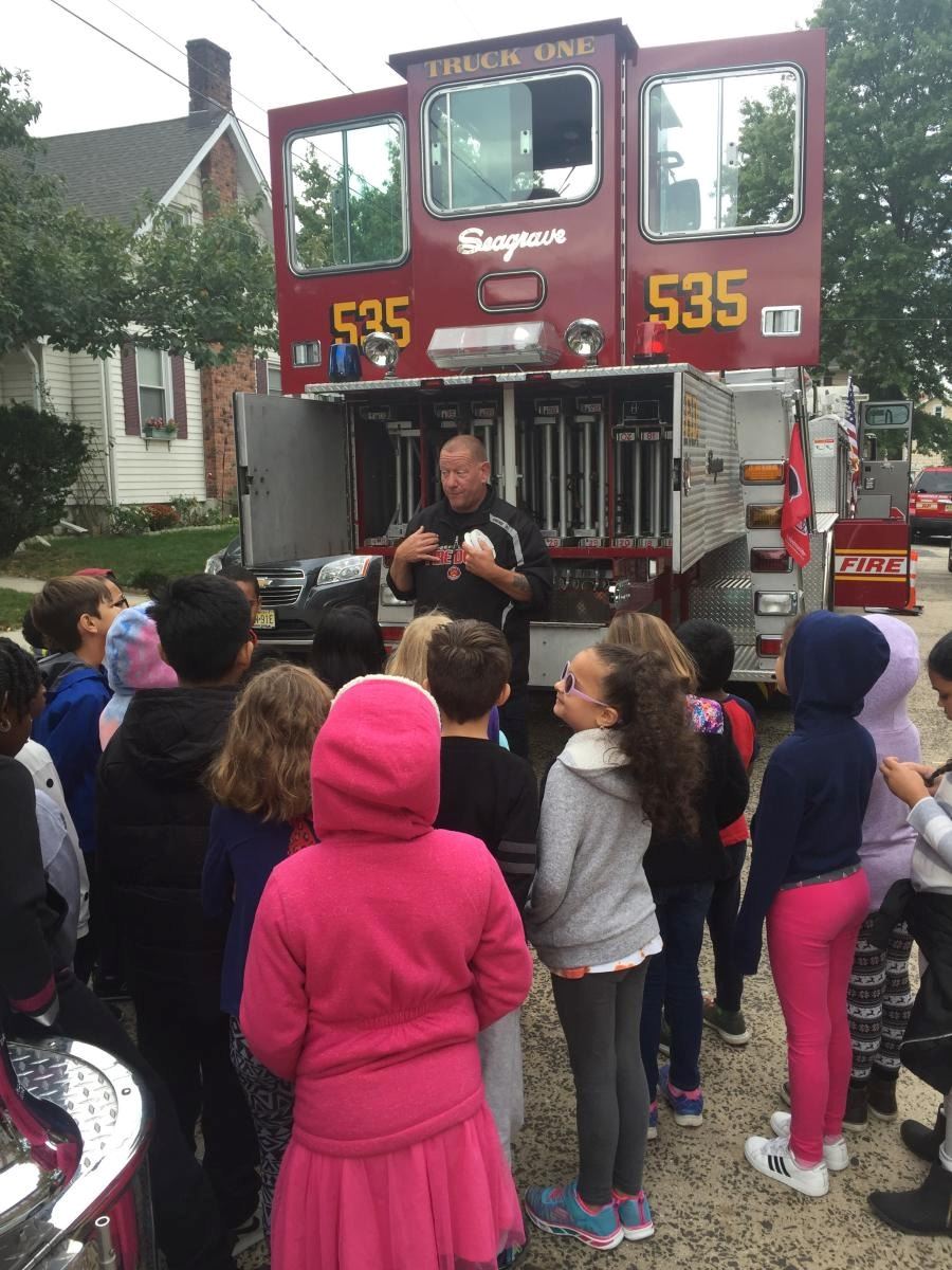 Fire Chief Talking to Children