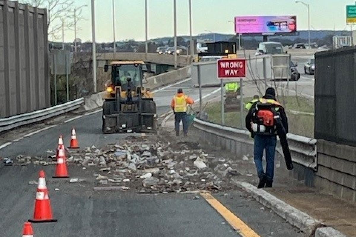 Cleaning litter from the Route 80 exit ramp.