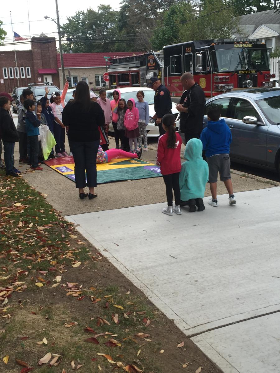 Children Practicing Stop Drop and Roll