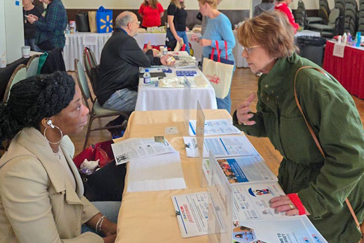 10th Annual Health Fair Participants  Visit and Speak with Exhibitors - Image