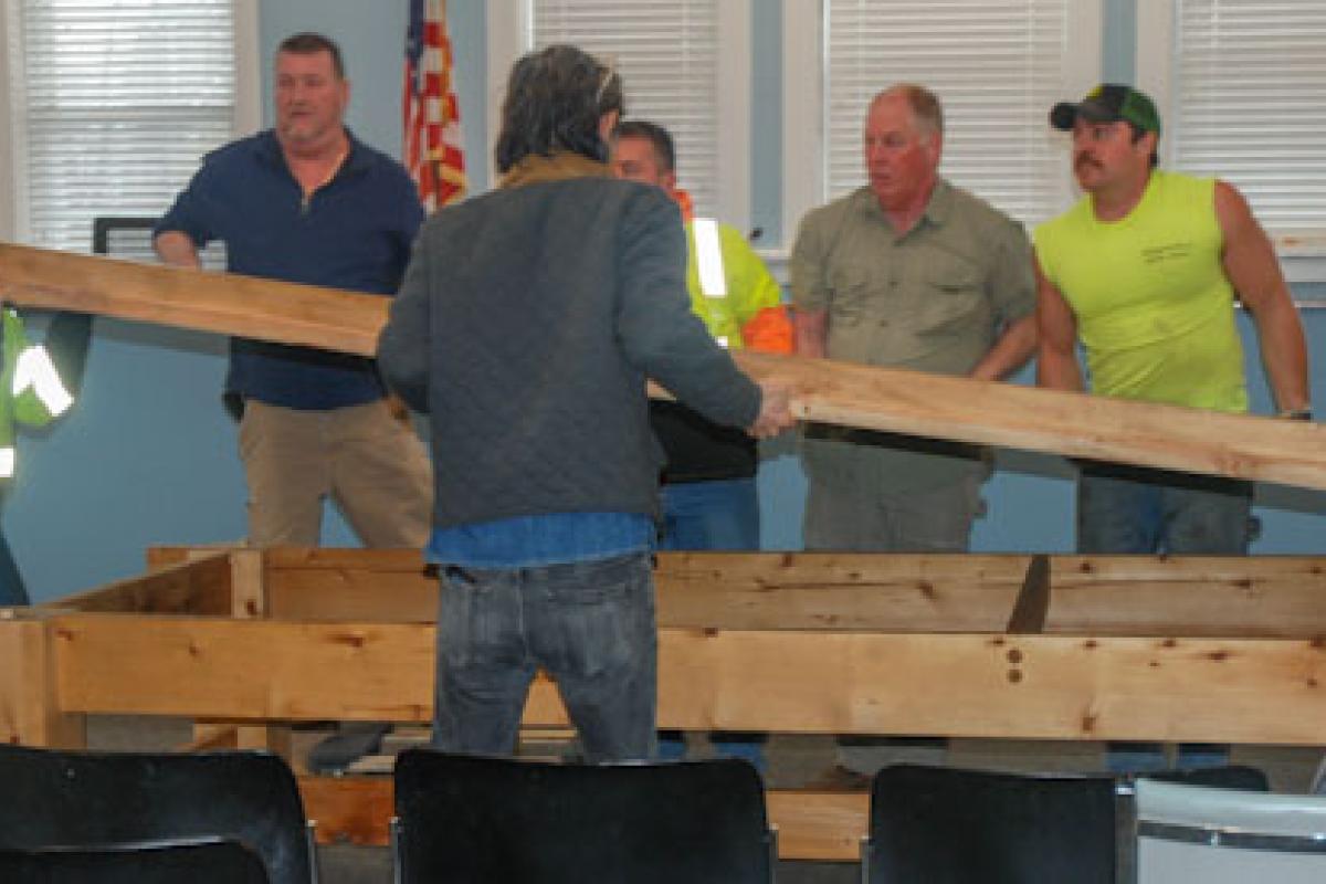 Ridgefield Park Department of Public Works' Employees Assemble Table in Municipal Building