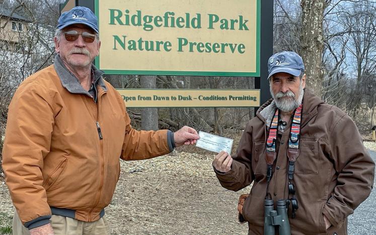 Bergen County Audubon Society President, Don Torino (r), presenting a check to RP Environmental Commission Chairman Steve Quinn